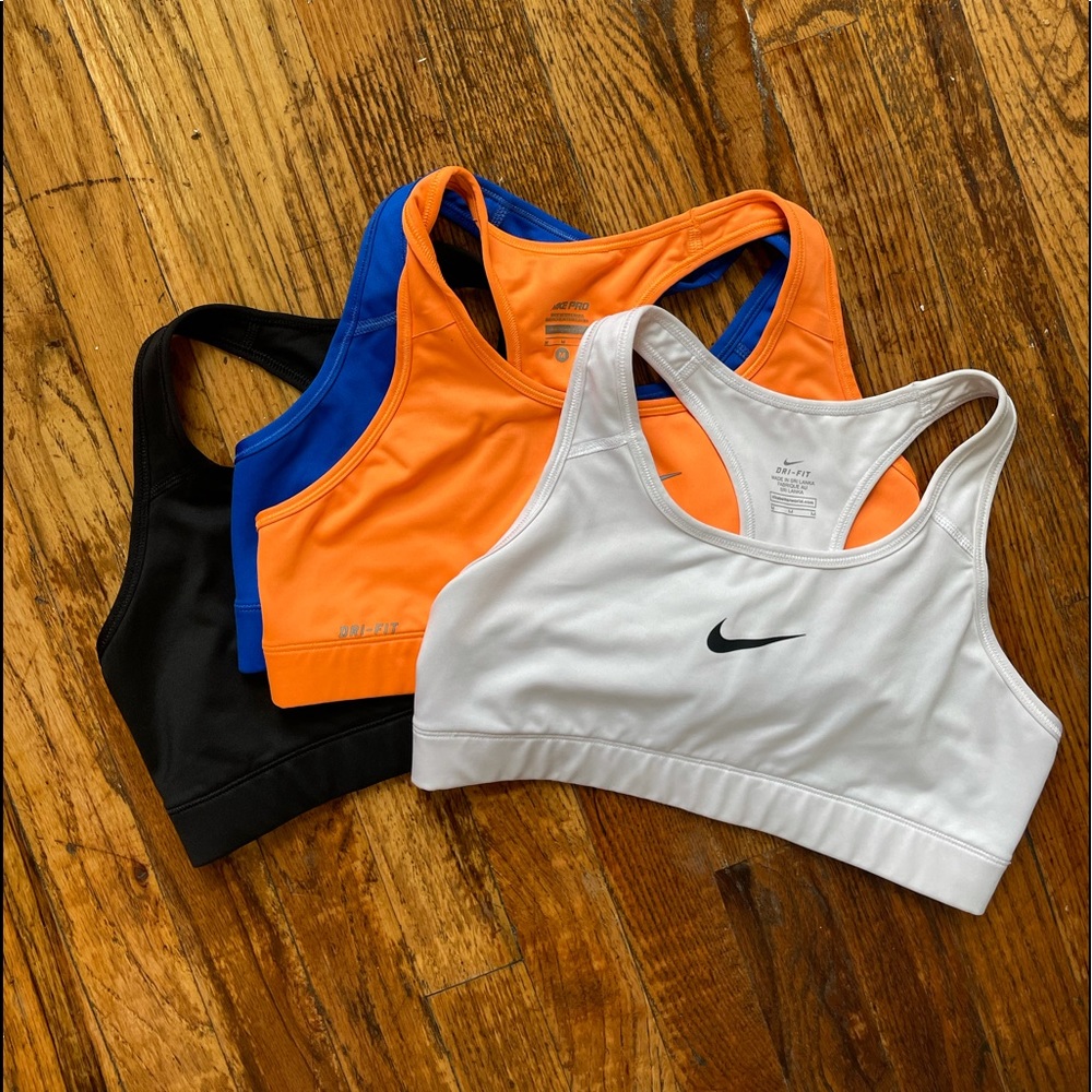 NEVER WORN brand new 4 Nike dri-fit / Nike Pro sports bras!!